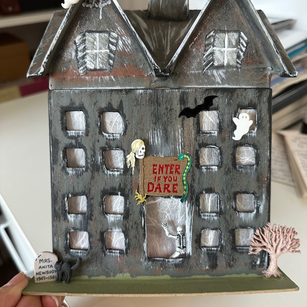 Paper Mache haunted house and two Halloween clay molds